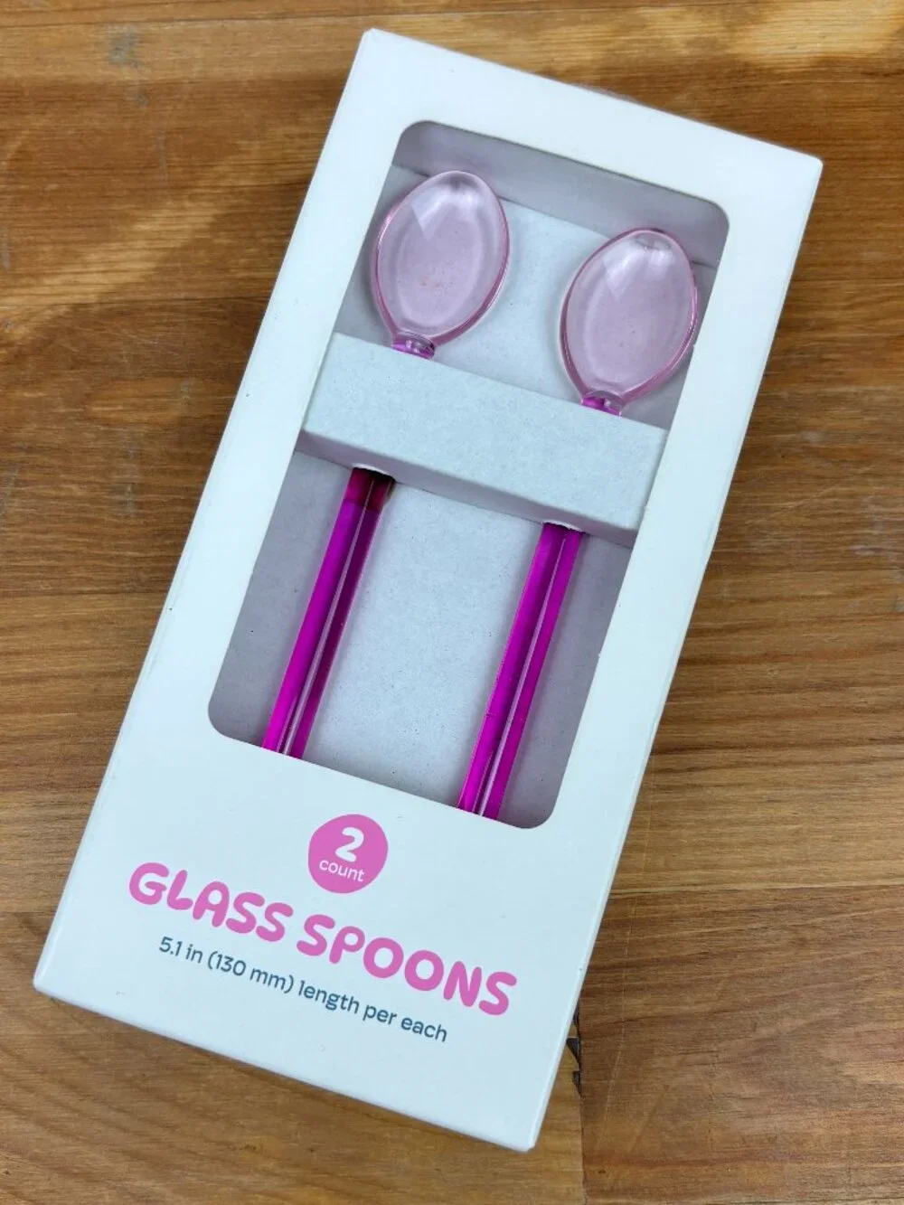 Set of two stylish pink glass spoons for coffee, tea, or cocktails. New